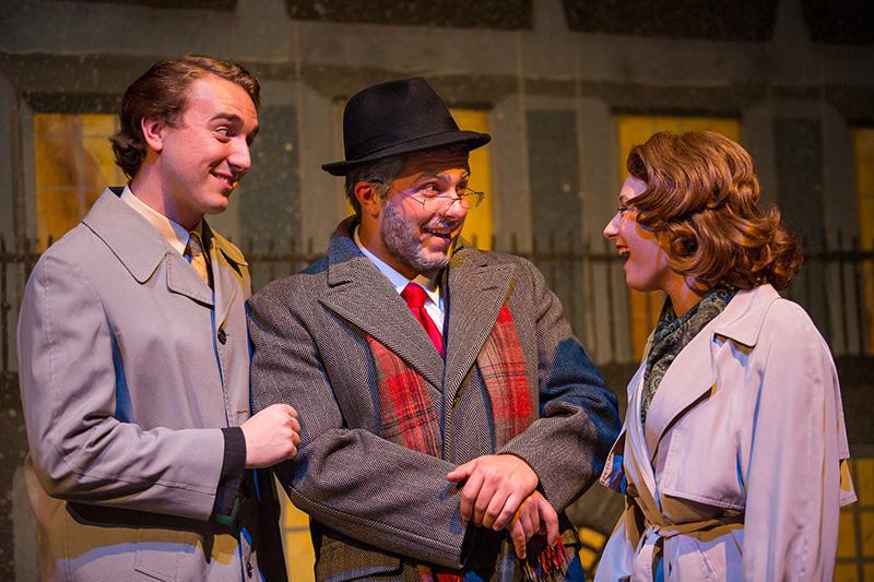 Kris Kringle (History major Jon Veres, center, from Pittsburgh) spreads holiday cheer to Shellhammer (Theatre and Dance major Clayton Rush, from Avella) and Doris (Theatre and Dance major Summer Gobel, from Port Vue )