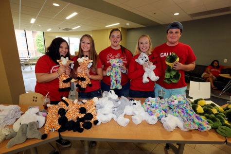 Members of the Student Activities Board show off their Stuff-A-Buddies.