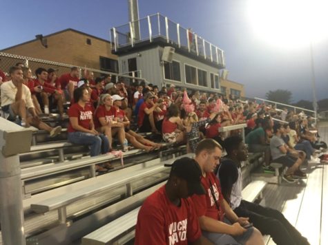 Fans fill the stands for the mens soccer "Code Red" game.