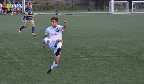 Senior, Cory Kuzilla, prevents the ball from getting past him.