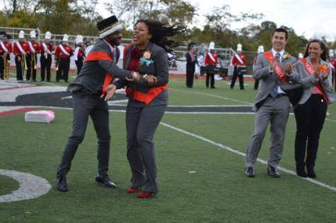 Lakijai Bynum celebrates with last year's Homecoming King, Ernest Brackins, after being named one of the 2016 Homecoming Queens.