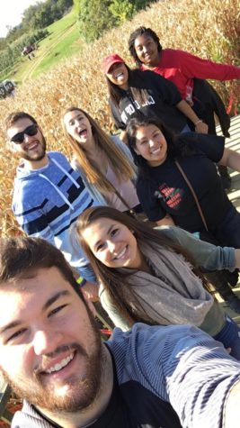 Students take a break from trying to find their way out the corn maze.