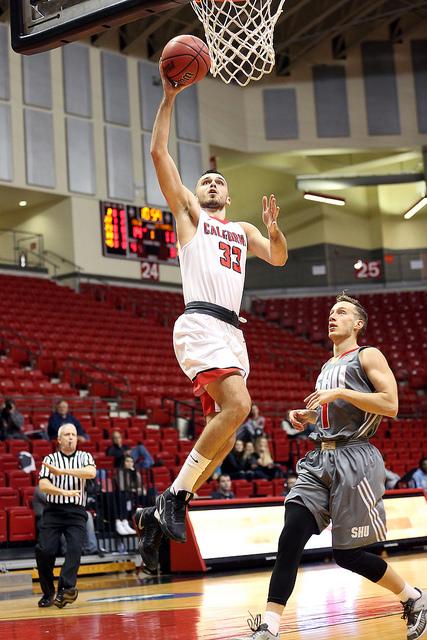 Luka Anđušić goes up for a shot against Seton Hill.