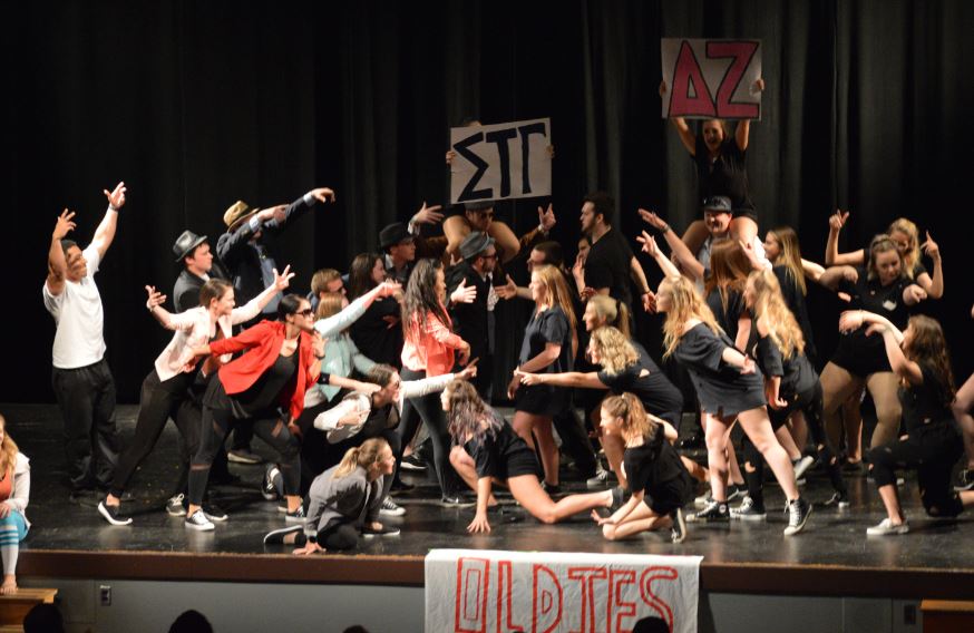 Members of Delta Zeta and Sigma Tau Gamma perform at this years Greek Sing competition.