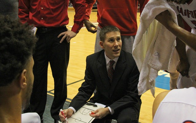 Kent McBride, center, goes over plays with last years Cal U Mens Basketball Team. This year, the team will introduce six new players.