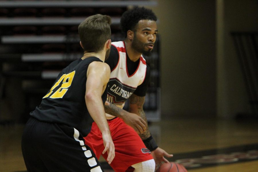 Cordell Smith dribbles the ball in a preseason game in November.