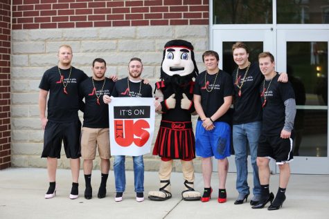 The men of California University of Pennsylvania wear high-heeled pumps and make their way around campus as they participate in the annual