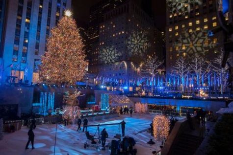 Rockefeller Center Tree Lights up NYC Skyline