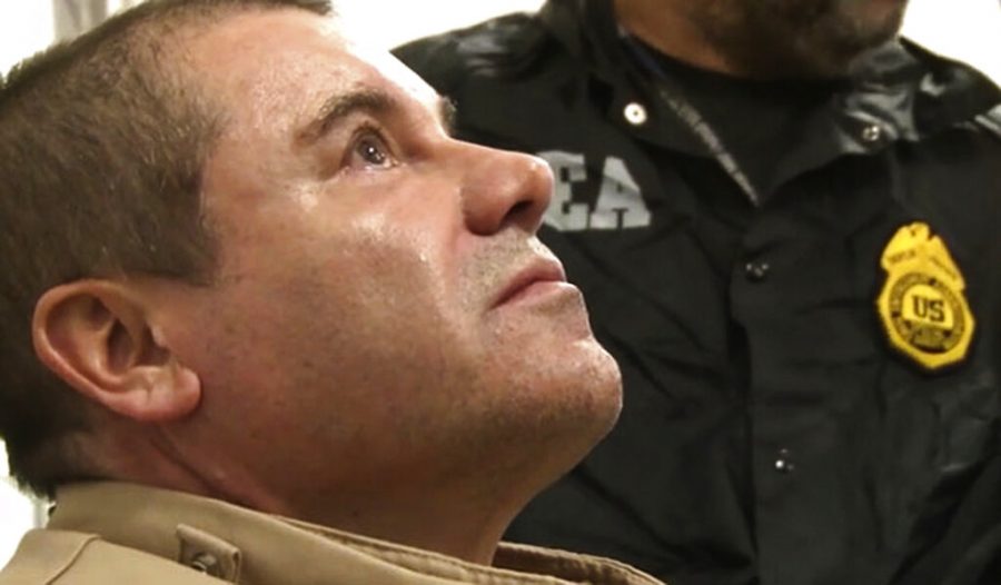 In this Jan. 19, 2017 photo provided by the United States Drug Enforcement Administration, Mexican drug kingpin Joaquin El Chapo Guzman arrives at Long Island MacArthur Airport in Ronkonkoma, N.Y., after being extradited to the United States to face drug trafficking charges. Guzman, was convicted Tuesday, Feb. 12, 2019, of running an industrial-scale smuggling operation after a three-month trial packed with Hollywood-style tales of grisly killings, political payoffs, cocaine hidden in jalapeno cans, jewel-encrusted guns and a naked escape with his mistress through a tunnel. (United States Drug Enforcement Administration via AP)