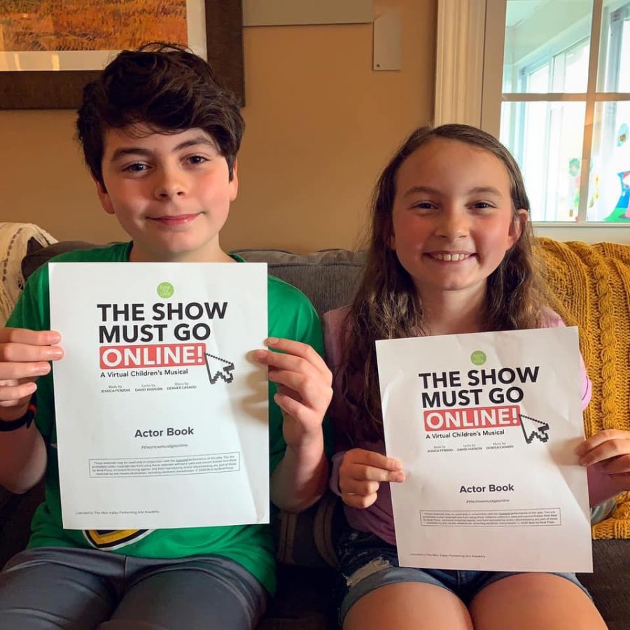 11-year-old+Holden+and+8-year-old+Eva+Kelly+of+California%2C+Pa.%2C+prepare+for+The+Show+Must+Go+Online+which+premiers+online+through+Facebook+on+June+12.
