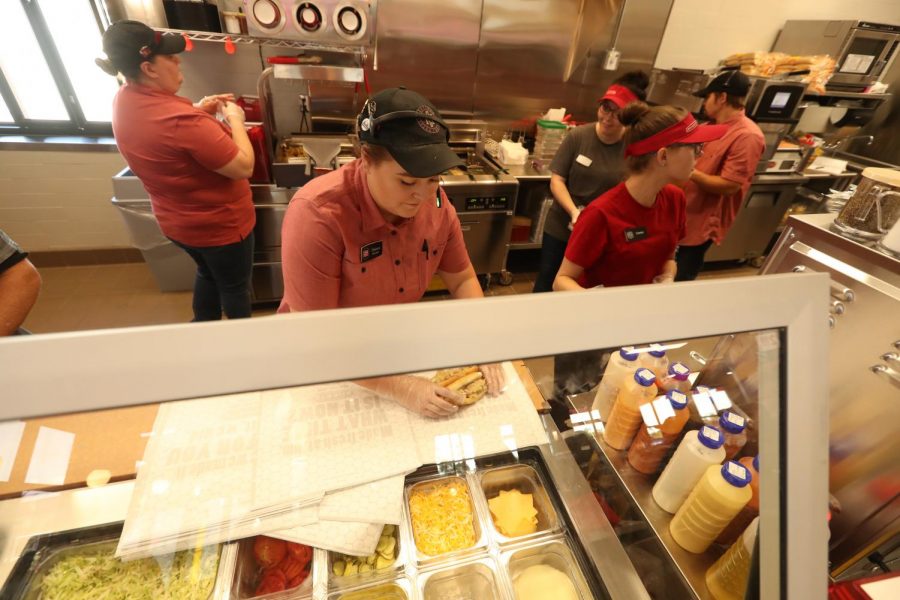 Workers in the food section of the Sheetz convenience store in Brownsville Pa. during the grand opening on Aug. 29, 2019.