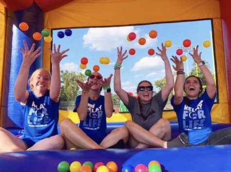 (L-R): Students Bailey Westfall, club president, Amanda Andrews, McKenna Ferris and Maria Dovshek, club vice president, at the 2019 Relay for Life event.