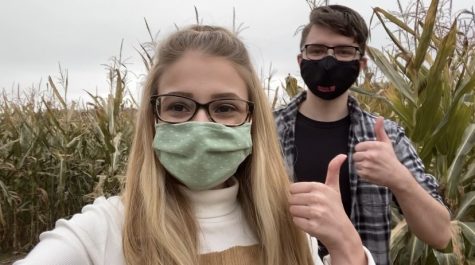 Cal Times' reporter Kaitlyn Collins and Matthew Bean in the corn maze at Duda's Farm fall festival.