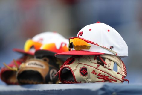 Ball caps and gloves on the roof of the dugout at a Cal U baseball game at Wild Things Park in Washington, Pa., Feb. 22, 2019.