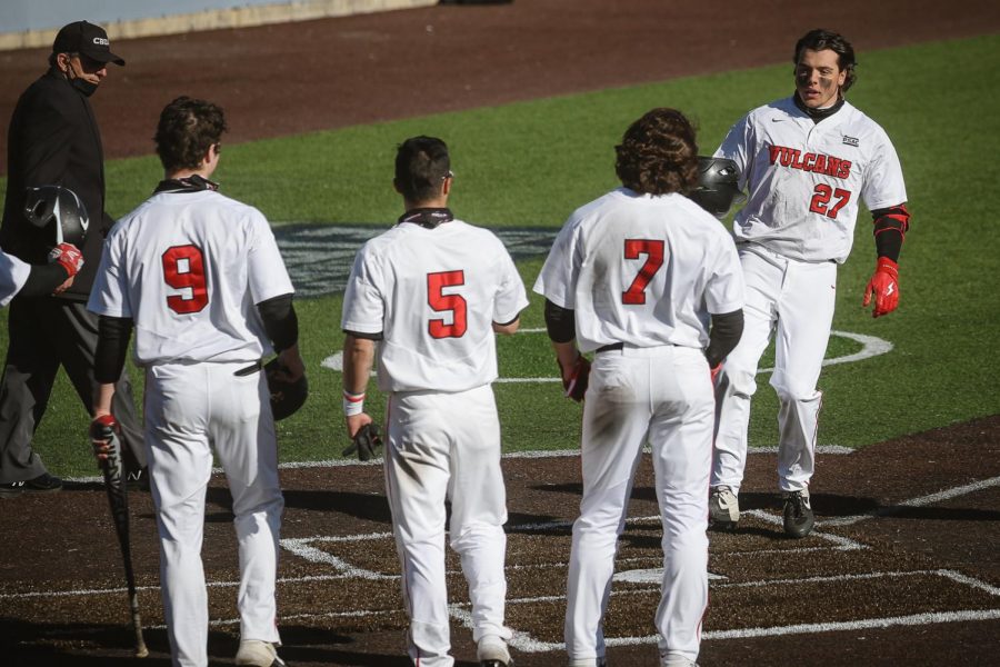 Junior shortstop Jacob McCaskey (27) approaches home plate after hitting a grand slam home run vs. Clarion on March 9, 2021.