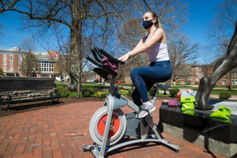 Maria Dolak leads an outdoor spin class in the Quad on March 30, 2021.