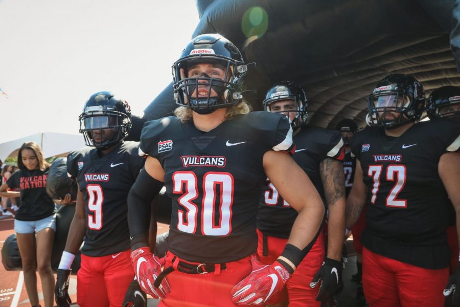 Cal U sophomore linebacker Noah Dillow (No. 30) prepares to enter the field at Adamson Stadium for the football game versus Millersville, Sept. 18, 2021