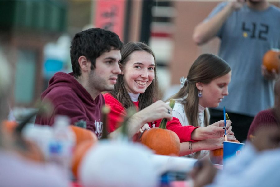 Cal+U+student+Rebekah+Schrack+looks+at+the+camera+while+participating+in+the+pumpkin+painting+event+at+the+Cal+U+Fall+Fest%2C+Oct.+20%2C+2021