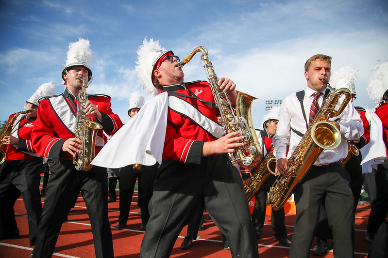 Members of the Cal U marching band exit the field following the football game halftime performance at Adamson Stadium, Oct. 2, 2021