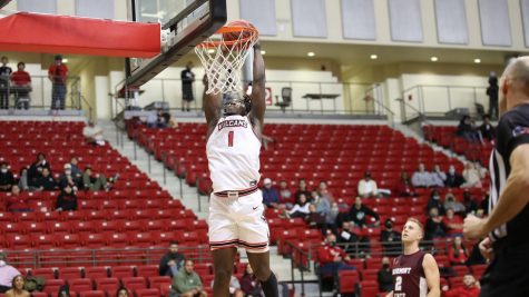 Philip Alston scores two of his 35 points versus Fairmont State, Convocation Center, Cal U., Nov. 18, 2021.   The Vulcans were edged by Fairmont, 95-92.
