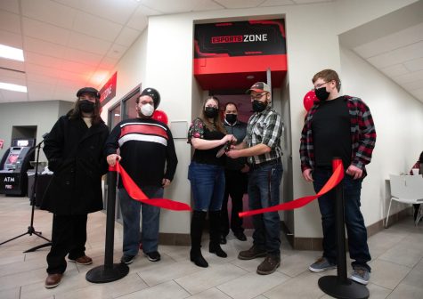Members of Cal Us Gaming Club cut the ribbon officially opening the brand new ESports Zone in the Natali Student Center.