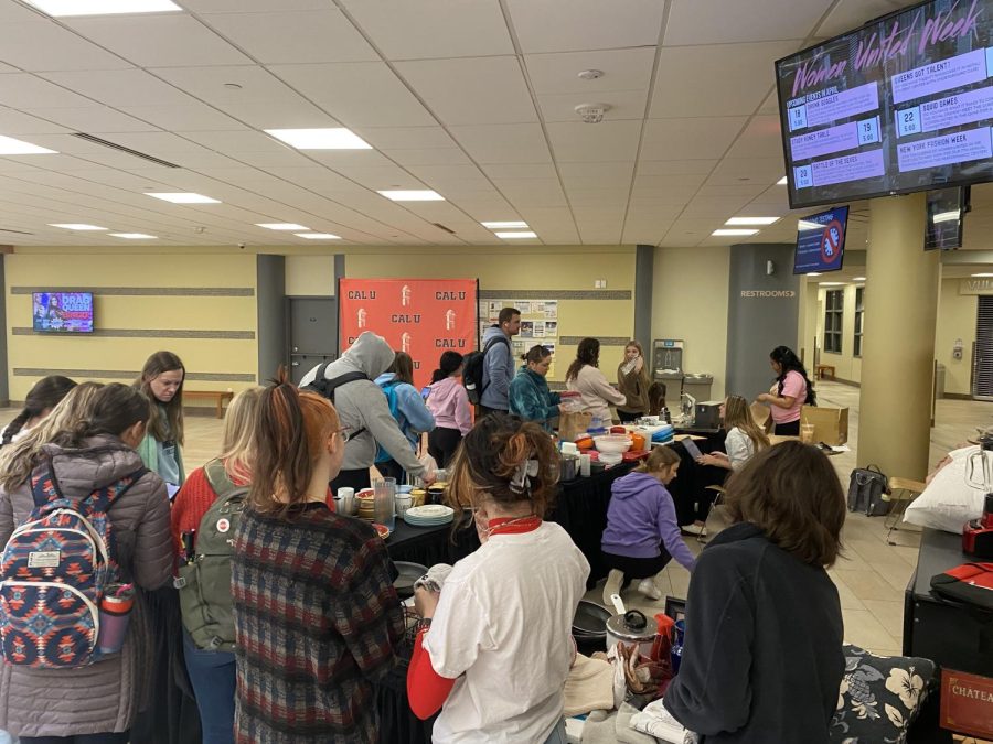 Students browsing a selection of free items at the Free Market Festival on April 19, 2022.