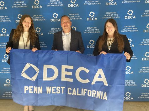 Image from Monday, April 17, 2023 Collegiate DECA International Career Development Conference (ICDC). PennWest California Students and Attendees (from left) Sarah Seader, Dr. Paul Hettler, and Jessica Galla. 