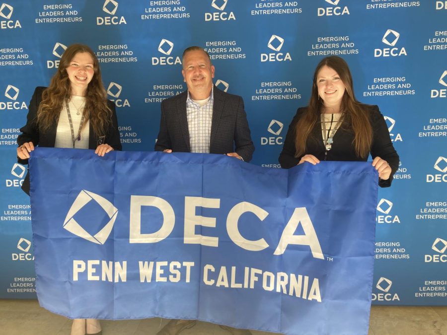 Image from Monday, April 17, 2023 Collegiate DECA International Career Development Conference (ICDC). PennWest California Students and Attendees (from left) Sarah Seader, Dr. Paul Hettler, and Jessica Galla. 