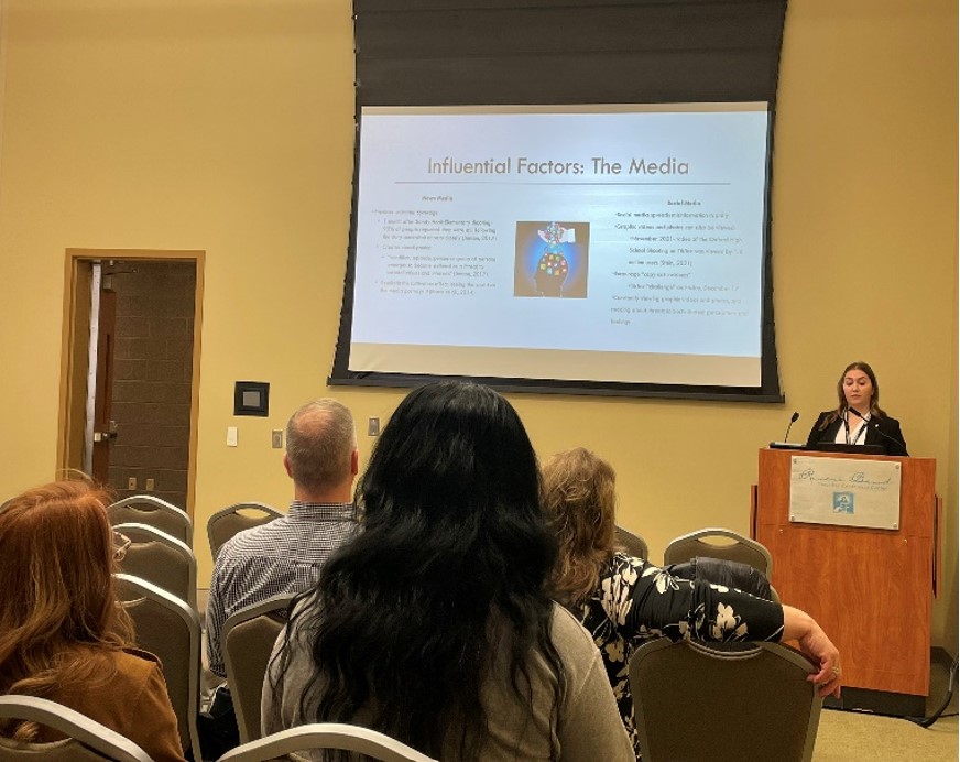 Honors Student, Brittany Brommer, presenting her thesis 