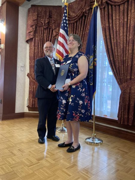 State Rep. Bud Cook handing Dr. Susan Rutledge her Service Recognition Award