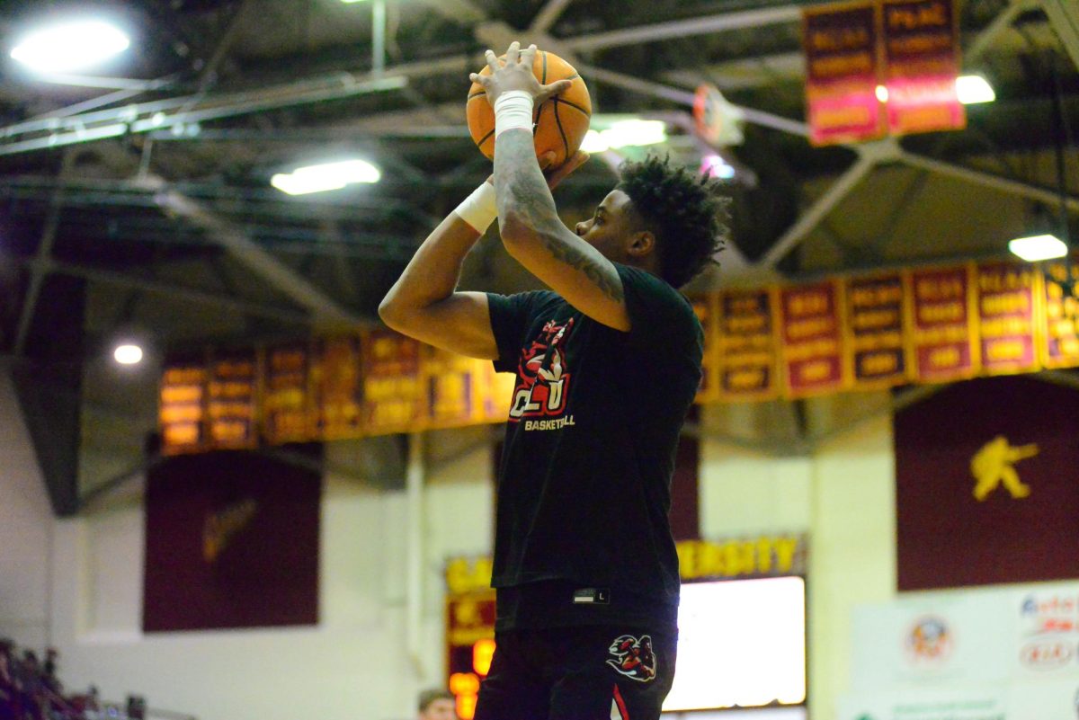 Jermaine Hall shooting the ball at Gannon on Jan. 14, 2023