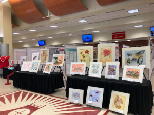Student artwork displayed in the convocation center lobby
