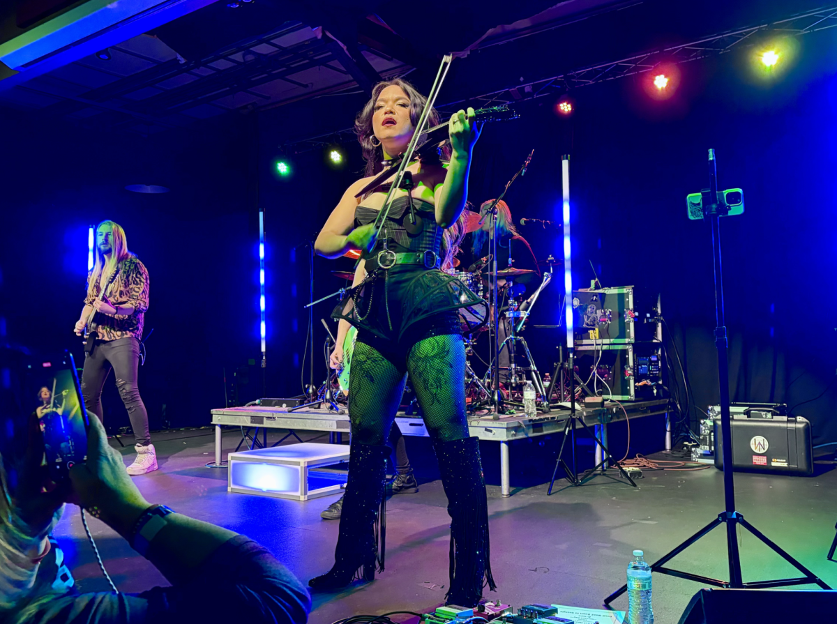 Mia Asano (Center) performs with her band at the Crafthouse. 