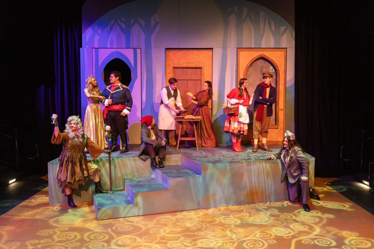 Student actors on the thrust stage of the Steele Hall Blaney Theatre