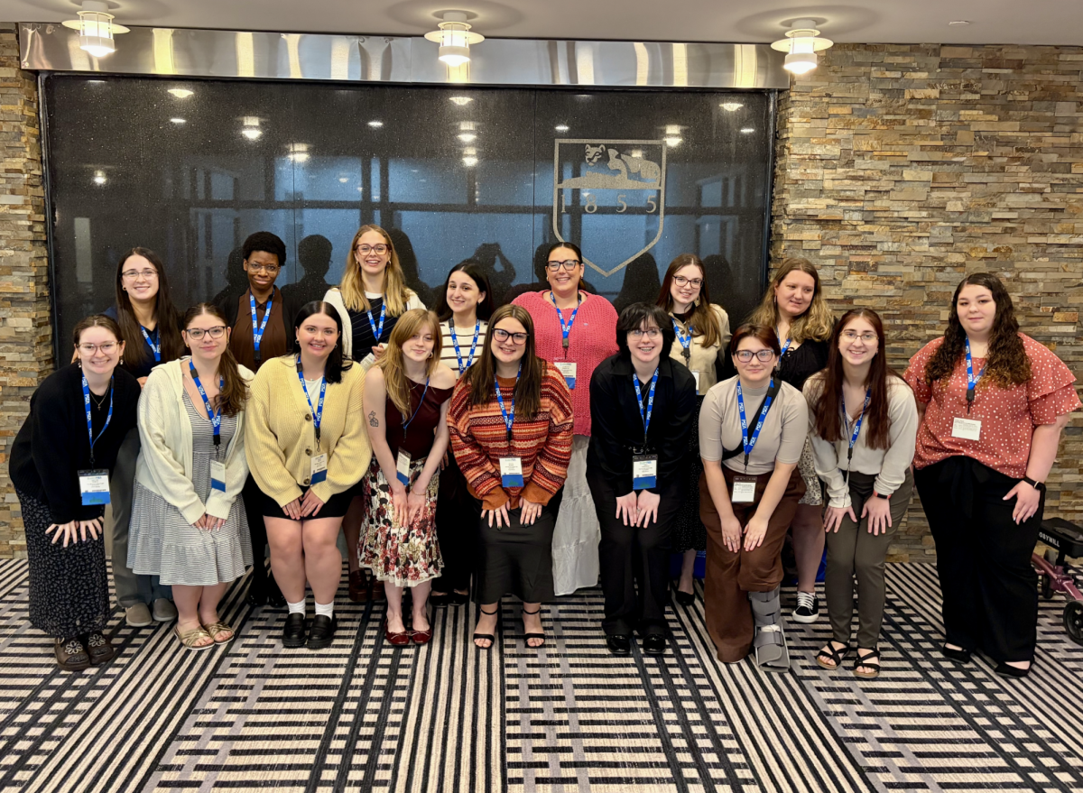 All attendees of the annual SPSEA conference posing for a group photo outside the Penn Stater Hotel and Conference Center